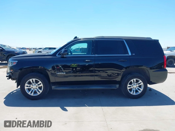 2015 Chevrolet Tahoe LS with VIN 1GNSCAKC5FR645736, listed as a IAAI auction lot 42064623 with 223,149 mi miles and . Bid and sale history available at DreamBid. Image 15.