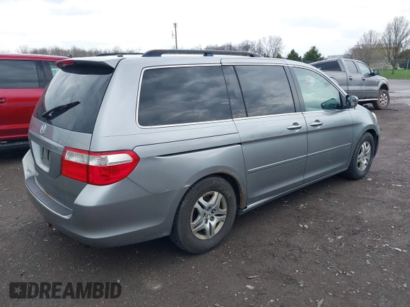 2005 Honda Odyssey EX-L with VIN 5FNRL38675B133498, listed as a IAAI auction lot 42046228 with 257,985 mi miles. Bid and sale history available at carsss.com. Image 4.