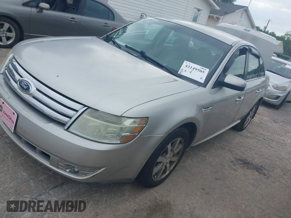 2008 Ford Taurus SEL with VIN 1FAHP24W48G125035, listed as a IAAI auction lot 42149505 with 201,502 mi miles. Bid and sale history available at carsss.com. Image 2.