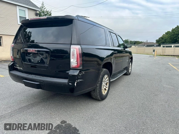 2016 GMC Yukon XL SLT with VIN 1GKS2GKC2GR180580, listed as a Copart auction lot 66899234 with 243,232 mi miles and Clean Title. Bid and sale history available at carsss.com. Image 3.