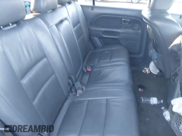 2006 Honda Pilot EX-L with VIN 2HKYF18776H553104, listed as a IAAI auction lot 41878219 with 265,894 mi miles and . Bid and sale history available at DreamBid. Image 8.