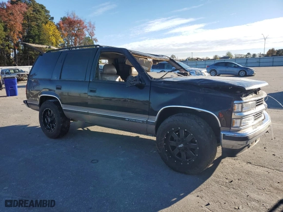 1998 Chevrolet Tahoe with VIN 1GNEK13R2WJ346738, listed as a Copart auction lot 82112764 with 135,422 mi miles and Salvage Title. Bid and sale history available at carsss.com. Image 4.