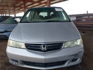 2002 Honda Odyssey EX with VIN 5FNRL18662B034817, listed as a IAAI auction lot 42359186 with 209,348 mi miles and . Bid and sale history available at DreamBid. Image 12.