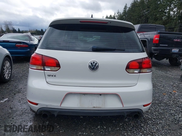 2010 Volkswagen GTI z VIN WVWFD7AJ3AW313279, wystawiony jako IAAI lot #41902259 z przebiegiem 91 594 mil mil oraz . Historia ofert i sprzedaży dostępna na DreamBid. Obrazek 17.
