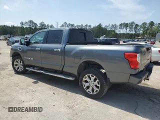 2017 Nissan Titan SL z VIN 1N6BA1F49HN514463, wystawiony jako Copart lot #51046805 z przebiegiem 99 686 mil mil oraz Szkody całkowita. Historia ofert i sprzedaży dostępna na DreamBid. Obrazek 2.