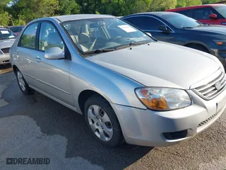 2009 Kia Spectra EX with VIN KNAFE221795620189, listed as a IAAI auction lot 41946984 with 131,913 mi miles. Bid and sale history available at carsss.com. Image 1.