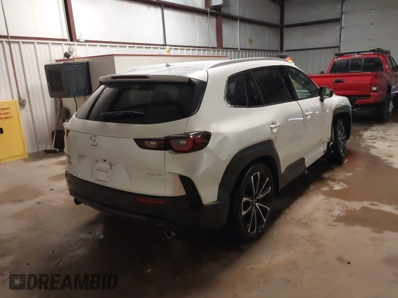 2023 Mazda CX-50 S Premium Plus with VIN 7MMVABEMXPN139186, listed as a IAAI auction lot 41289690 with 26,556 mi miles and . Bid and sale history available at DreamBid. Image 4.