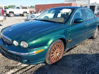 2006 Jaguar X-Type with VIN SAJWA51A46WE99813, listed as a IAAI auction lot 42011197 with 215,839 mi miles and . Bid and sale history available at DreamBid. Image 6.