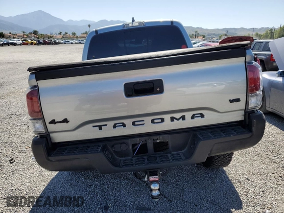 2023 Toyota Tacoma SR with VIN 3TMCZ5AN8PM545588, listed as a Copart auction lot 57528655 with 73,286 mi miles and Salvage title. Bid and sale history available at DreamBid. Image 6.