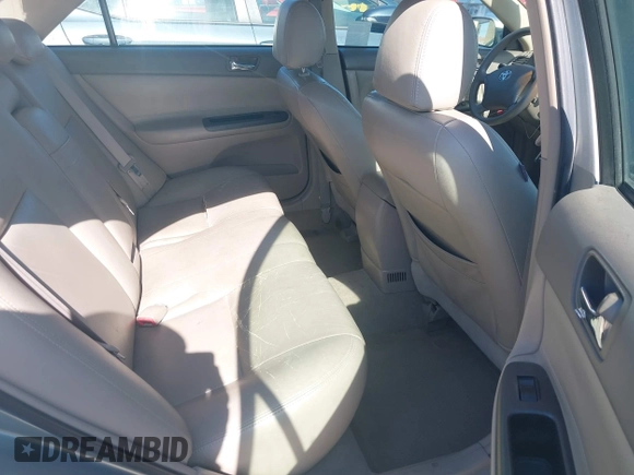2005 Toyota Camry LE z VIN 4T1BE30K65U592500, wystawiony jako IAAI lot #42373718 z przebiegiem 189 054 mil mil oraz . Historia ofert i sprzedaży dostępna na DreamBid. Obrazek 8.