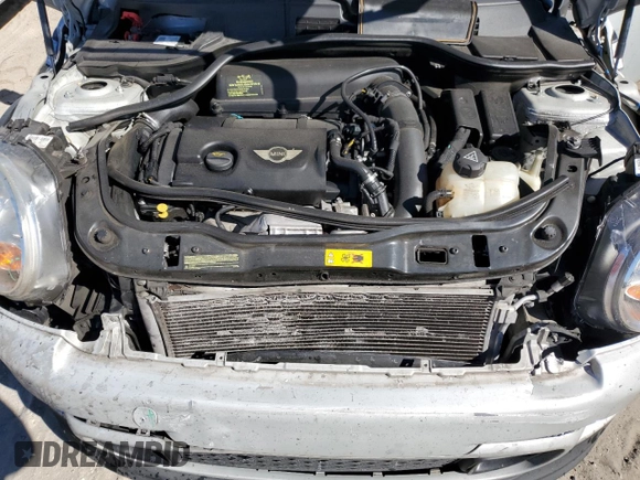 2014 MINI Coupe S z VIN WMWSX3C57ET409158, wystawiony jako Copart lot #81650034 z przebiegiem 118 523 mil mil oraz Szkoda całkowita • Salvage title. Historia ofert i sprzedaży dostępna na DreamBid. Obrazek 11.