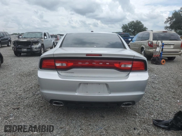 2012 Dodge Charger SE with VIN 2C3CDXBG4CH203207, listed as a Copart auction lot 69533004 with 156,015 mi miles and Salvage Title. Bid and sale history available at DreamBid. Image 6.