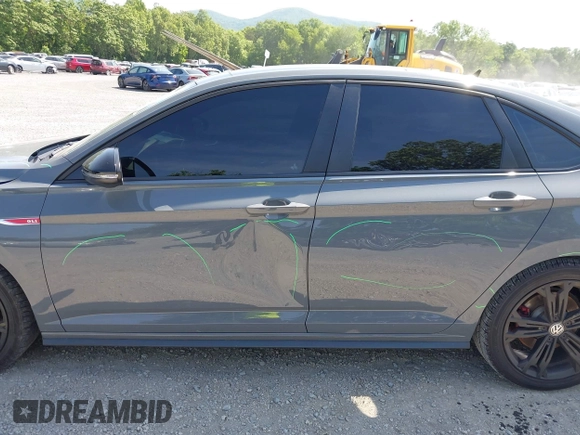 2021 Volkswagen Jetta GLI S z VIN 3VW6T7BU9MM052902, wystawiony jako IAAI lot #42286711 z przebiegiem 91 519 mil mil oraz . Historia ofert i sprzedaży dostępna na DreamBid. Obrazek 19.