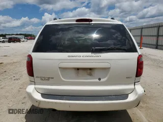 2005 Dodge Caravan SXT z VIN 2D4GP44L15R380469, wystawiony jako Copart lot #58800775 z przebiegiem Nie podano mil oraz Szkoda całkowita • Salvage title. Historia ofert i sprzedaży dostępna na DreamBid. Obrazek 6.