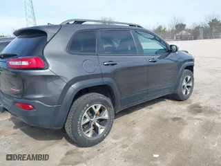 2015 Jeep Cherokee Trailhawk with VIN 1C4PJMBS3FW520328, listed as a IAAI auction lot 41746017 with 83,485 mi miles. Bid and sale history available at carsss.com. Image 4.