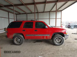 2002 Chevrolet Tahoe LT with VIN 1GNEC13Z52R148406, listed as a IAAI auction lot 41617948 with 190,502 mi miles and . Bid and sale history available at DreamBid. Image 13.