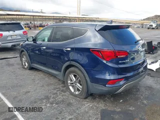 2017 Hyundai Santa Fe 2.4L z VIN 5XYZT3LB1HG489625, wystawiony jako IAAI lot #41784791 z przebiegiem 95 435 mil mil oraz . Historia ofert i sprzedaży dostępna na DreamBid. Obrazek 3.