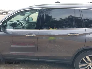 2017 Honda Pilot Touring with VIN 5FNYF6H92HB012090, listed as a IAAI auction lot 41882542 with 110,179 mi miles and . Bid and sale history available at DreamBid. Image 14.