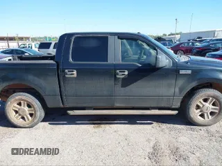 2007 Ford F-150 XLT z VIN 1FTRW12W77KA79128, wystawiony jako IAAI lot #41099284 z przebiegiem 154 191 mil mil oraz . Historia ofert i sprzedaży dostępna na DreamBid. Obrazek 13.