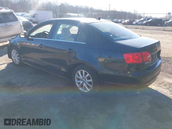 2013 Volkswagen Jetta Sedan SE w/Convenience/Sunroof with VIN 3VWDX7AJ9DM424595, listed as a IAAI auction lot 41807615 with 102,971 mi miles. Bid and sale history available at carsss.com. Image 3.