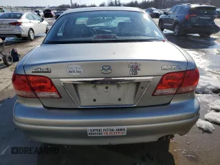 2002 Mazda Millenia z VIN JM1TA221921738582, wystawiony jako Copart lot #88500905 z przebiegiem 182 323 mil mil oraz Szkody całkowita. Historia ofert i sprzedaży dostępna na DreamBid. Obrazek 6.