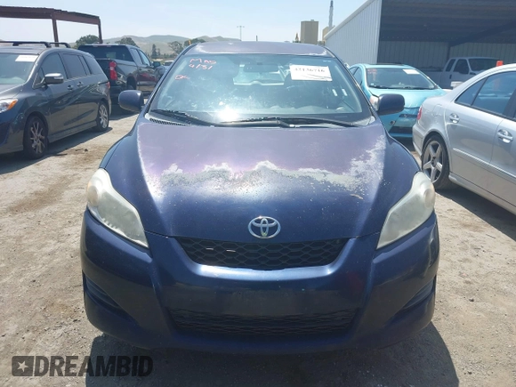 2009 Toyota Matrix with VIN 2T1KU40E99C119135, listed as a IAAI auction lot 42136716 with 185,155 mi miles. Bid and sale history available at carsss.com. Image 12.