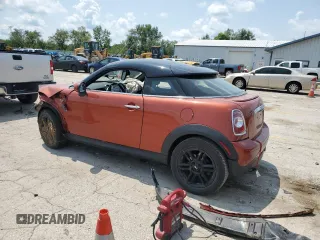 2014 MINI Cooper Coupe with VIN WMWSX1C53ET507902, listed as a Copart auction lot 64094884 with 0 mi miles and Salvage Title. Bid and sale history available at carsss.com. Image 2.