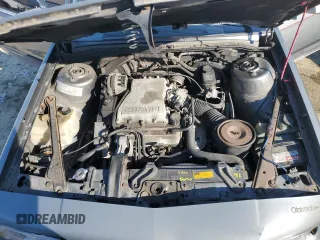 1989 Oldsmobile Cutlass z VIN 1G3AJ51W1KG334940, wystawiony jako Copart lot #42258445 z przebiegiem 97 318 mil mil oraz Szkody całkowita. Historia ofert i sprzedaży dostępna na DreamBid. Obrazek 13.
