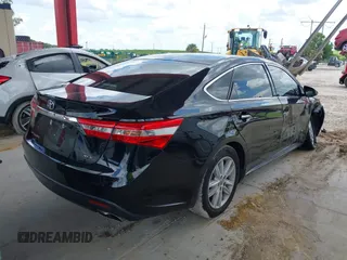 2013 Toyota Avalon XLE with VIN 4T1BK1EB6DU056103, listed as a IAAI auction lot 42553318 with 114,143 mi miles and . Bid and sale history available at DreamBid. Image 4.