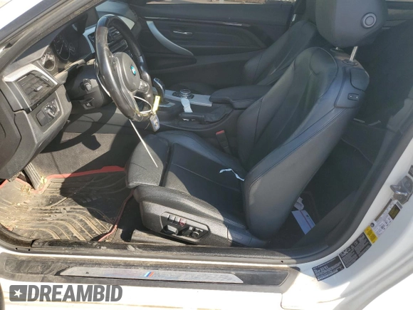 2015 BMW 4 Series 428i xDrive with VIN WBA3N5C5XFK197692, listed as a Copart auction lot 77219684 with 96,148 mi miles and Salvage title. Bid and sale history available at DreamBid. Image 7.