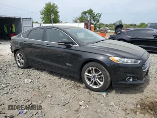 2016 Ford Fusion Titanium with VIN 3FA6P0SU7GR349548, listed as a Copart auction lot 53116325 with 124,354 mi miles and Salvage title. Bid and sale history available at DreamBid. Image 4.