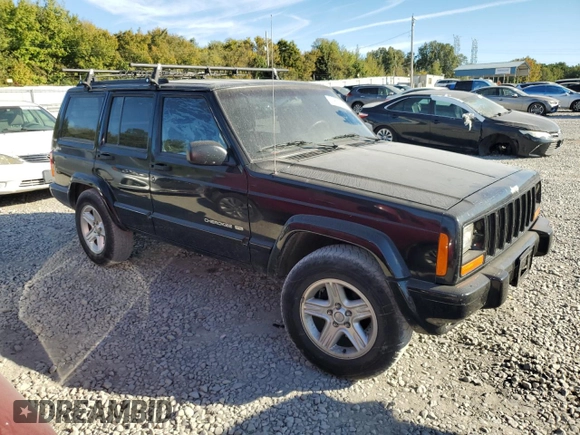 2001 Jeep Cherokee Sport z VIN 1J4FF58S61L612533, wystawiony jako Copart lot #76824714 z przebiegiem 62 401 mil mil oraz Szkoda całkowita • Salvage title. Historia ofert i sprzedaży dostępna na DreamBid. Obrazek 4.