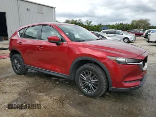 2019 Mazda CX-5 Sport with VIN JM3KFABM5K1597891, listed as a Copart auction lot 55020815 with 100,454 mi miles and Non Repairable. Bid and sale history available at DreamBid. Image 4.