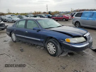 2002 Lincoln Continental with VIN 1LNHM97V22Y682098, listed as a Copart auction lot 77821624 with 0 mi miles and Salvage Title. Bid and sale history available at carsss.com. Image 4.