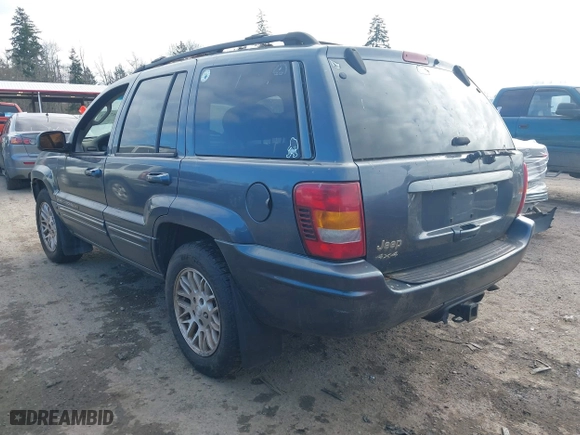 2003 Jeep Grand Cherokee Limited with VIN 1J8GW58S93C589285, listed as a IAAI auction lot 41467743 with 231,614 mi miles. Bid and sale history available at carsss.com. Image 3.