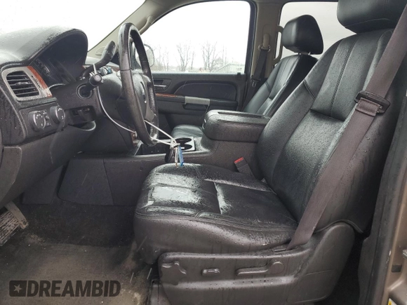 2013 Chevrolet Suburban LT with VIN 1GNSKJE77DR131188, listed as a Copart auction lot 52880375 with 147,278 mi miles and Salvage Title. Bid and sale history available at DreamBid. Image 7.
