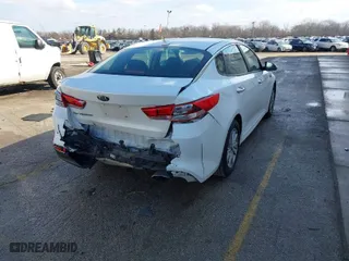 2018 Kia Optima LX with VIN 5XXGT4L3XJG216120, listed as a IAAI auction lot 41691044 with 124,919 mi miles. Bid and sale history available at carsss.com. Image 4.
