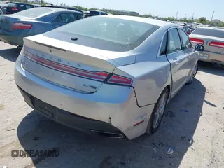 2015 Lincoln MKZ with VIN 3LN6L2J97FR608175, listed as a IAAI auction lot 41860094 with 196,965 mi miles and . Bid and sale history available at DreamBid. Image 4.