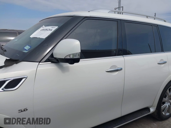 2014 Infiniti QX80 z VIN JN8AZ2NF1E9552567, wystawiony jako IAAI lot #40608266 z przebiegiem 94 809 mil mil oraz . Historia ofert i sprzedaży dostępna na DreamBid. Obrazek 14.