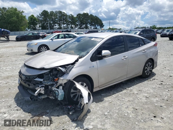 2021 Toyota Prius LE with VIN JTDKAMFPXM3184126, listed as a Copart auction lot 56857675 with 54,676 mi miles and Clean Title. Bid and sale history available at DreamBid. Image 1.