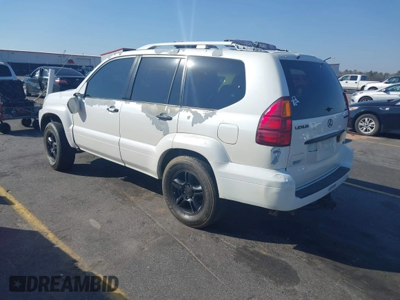 2004 Lexus GX 470 with VIN JTJBT20XX40063036, listed as a IAAI auction lot 41780865 with 222,285 mi miles. Bid and sale history available at carsss.com. Image 3.