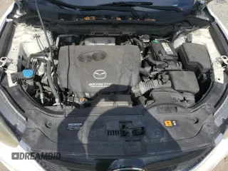 2014 Mazda CX-5 Sport with VIN JM3KE2BE9E0344990, listed as a Copart auction lot 59014145 with 126,905 mi miles and Salvage title. Bid and sale history available at DreamBid. Image 11.