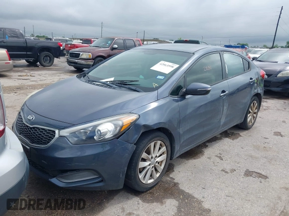 2014 Kia Forte LX with VIN KNAFX4A62E5221011, listed as a IAAI auction lot 42063598 with 187,649 mi miles. Bid and sale history available at carsss.com. Image 2.