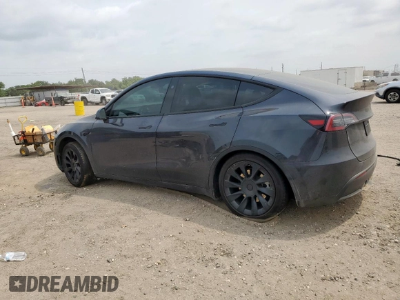 2024 Tesla Model Y Long Range with VIN 7SAYGDEE2RA287446, listed as a Copart auction lot 57640895 with 27,932 mi miles and Salvage title. Bid and sale history available at DreamBid. Image 2.