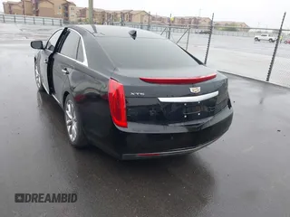 2016 Cadillac XTS Livery Package with VIN 2G61U5S38G9136327, listed as a IAAI auction lot 41935174 with 136,672 mi miles. Bid and sale history available at carsss.com. Image 3.