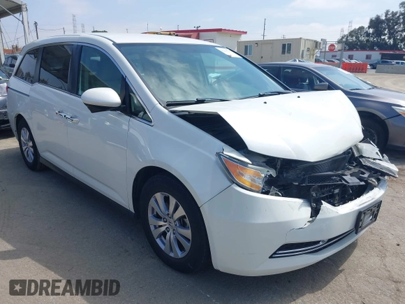 2016 Honda Odyssey SE with VIN 5FNRL5H33GB043303, listed as a IAAI auction lot 42215233 with 67,097 mi miles and . Bid and sale history available at DreamBid. Image 1.