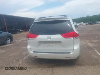 2014 Toyota Sienna XLE with VIN 5TDYK3DC2ES517663, listed as a IAAI auction lot 42171862 with 143,447 mi miles and . Bid and sale history available at DreamBid. Image 16.