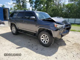 2016 Toyota 4Runner Limited with VIN JTEBU5JR7G5399389, listed as a Copart auction lot 60488235 with 105,376 mi miles and Salvage title. Bid and sale history available at DreamBid. Image 4.