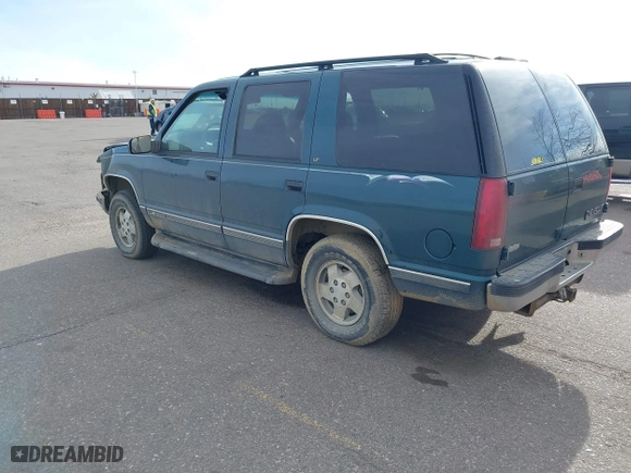 1995 Chevrolet Tahoe with VIN 1GNEK13K7SJ396709, listed as a IAAI auction lot 41776923 with 183,877 mi miles. Bid and sale history available at carsss.com. Image 3.