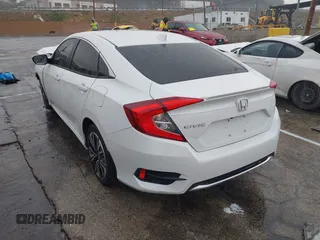 2020 Honda Civic EX-L with VIN 19XFC1F7XLE208720, listed as a IAAI auction lot 41725235 with 70,794 mi miles and . Bid and sale history available at DreamBid. Image 3.